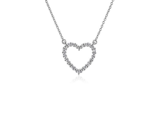 Externalize your love with this heart shaped pendant encircled with 1/4 carat of diamonds. Pristine 14k white gold ensures your adoration endures, year after year.