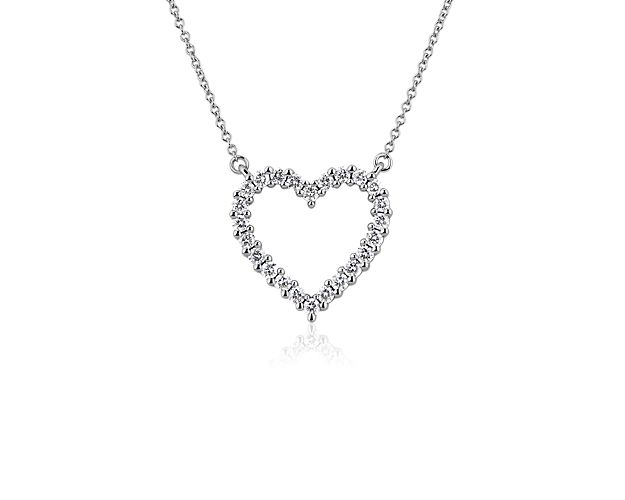 Externalize your love with this heart shaped pendant encircled with 1/2 carat of diamonds. Pristine 14k white gold ensures your adoration endures, year after year.