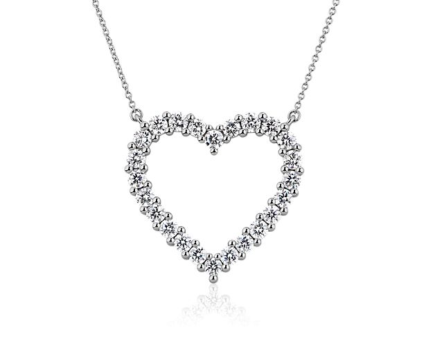 Externalize your love with this heart shaped pendant encircled with two carats of diamonds. Pristine 14k white gold ensures your adoration endures, year after year.