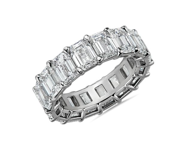 A continuous circle of emerald-cut diamonds gives this 11 ct. tw. eternity ring a modern sophistication. Works beautifully as a wedding ring or anniversary gift. Add it to a stack of other eternity rings for an on-trend right hand look.