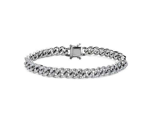 Add a handsome statement with this comfortably weighted 14k white gold link bracelet. Each individual link is beautifully accented by diamonds to give it dramatic sparkle.