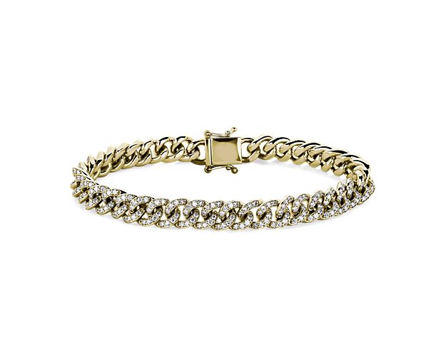 Add luxurious shimmer to your look with this handsome link bracelet featuring diamonds set around each individual link. The 14k yellow gold design features a warmly lustrous look.