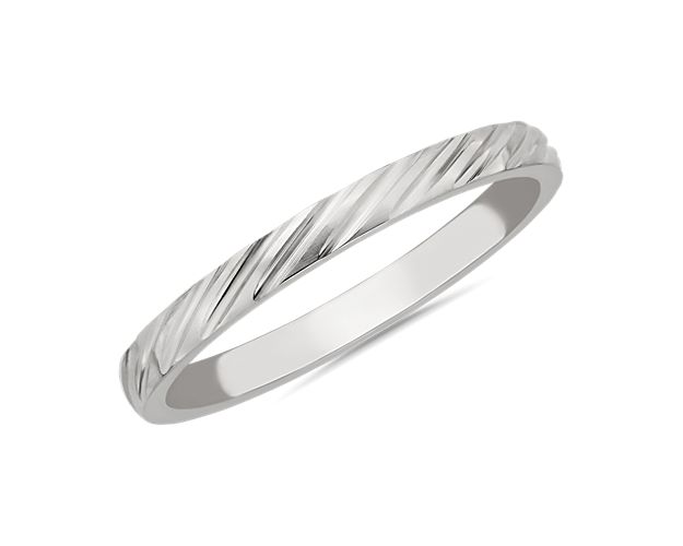 Elegantly angled stripe texturing adds soothing dimension and detail to this sleek stackable band. It boasts gleaming 14k white gold design for enduring quality.