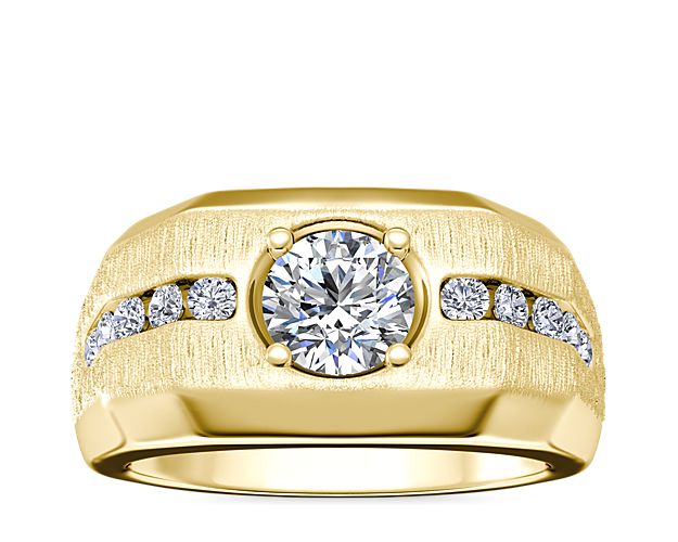 Timelessly sophisticated, this engagement ring is crafted from 14k yellow gold and boasts an elegant brushed finish. The center setting is ready to hold your chosen round, cushion, princess (prince), emerald-cut, radiant, or oval diamond, and channel-set diamonds add intricate sparkle.