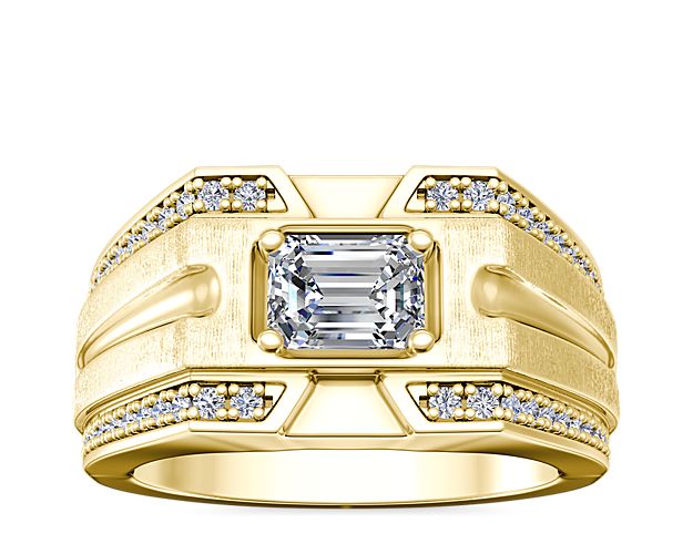Grooved design gives this 14k yellow gold engagement ring an eye-catching contemporary look, while intricate channel-set diamonds shimmer along the outer edges. At the heart, an east-west set stone adds dramatic sparkle.