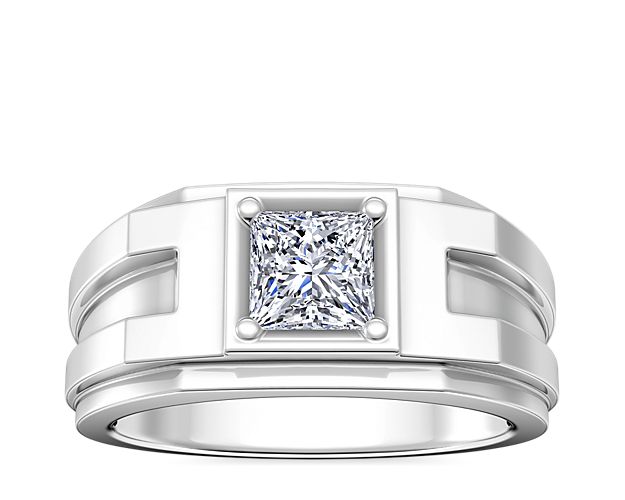This engagement ring boasts stunning geometric structure in the gleaming platinum design. The statement center setting is designed to support a princess (prince), asscher, or cushion-cut diamond.