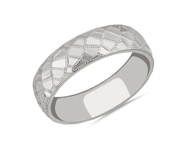 Commemorate your love in timeless style with this polished wedding band crafted from platinum. The mosaic-textured detail gives it an eye-catching unique look.