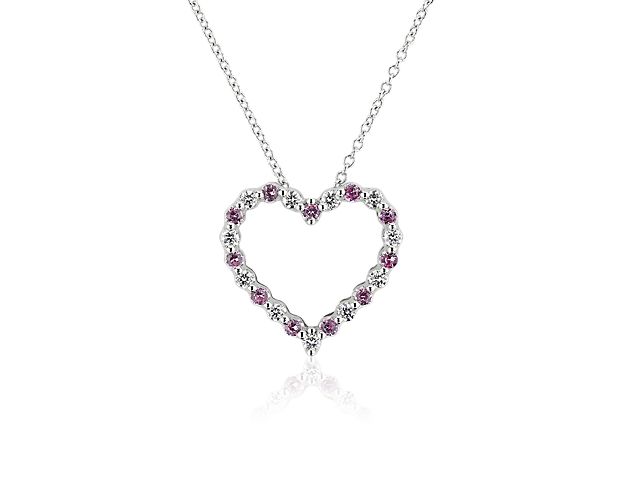 Let a hint of romance infuse your style as you accentuate your look with this heart-shaped floating pendant. Soft pink sapphires and shimmering diamonds alternate along the gleaming 14k white gold design.