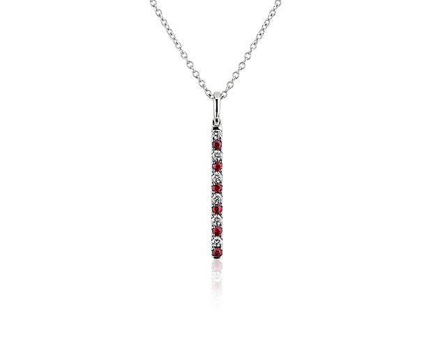 Timeless rubies and diamonds meet an updated bar shape on this 14k white gold pendant necklace.