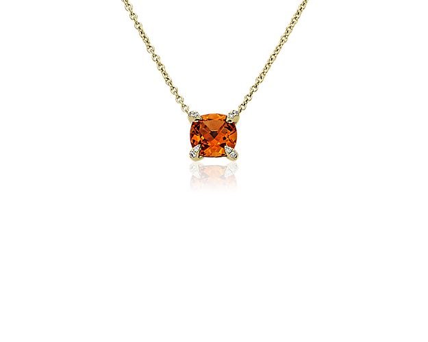 Look lovely as you wear this pendant flaunting a brilliantly hued cushion-cut citrine stone. The 14k yellow gold design features bright diamonds inlaid along the center stone's corner prongs, which lend dramatic sparkle to this statement piece.