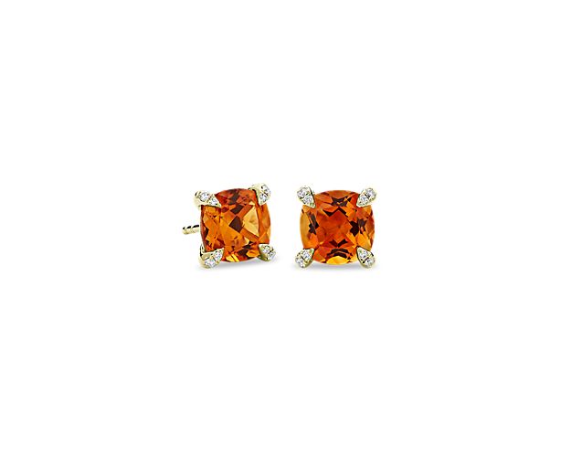 Add a little sparkle to your style with these beautifully shimmering stud earrings showcasing brilliantly yellow cushion-cut citrine stones. The 14k yellow gold setting features brilliant diamonds nestled in the prongs holding the main stone.