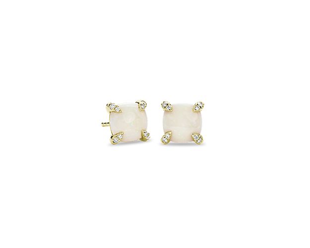 Infuse your look with timeless elegance when you wear these sophisticated stud earrings boasting dreamy cushion-cut opals accentuated by shimmering diamonds set in the prongs around the main stone. The lustrous 14k yellow gold setting completes the style with luxurious warmth.