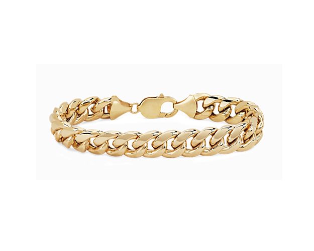The classic Miami Cuban link bracelet is crafted in polished 14k yellow gold. This timeless pieces is great for everyday wear, and is a classic staple. This 9" bracelet is secured with a lobster claw clasp.
