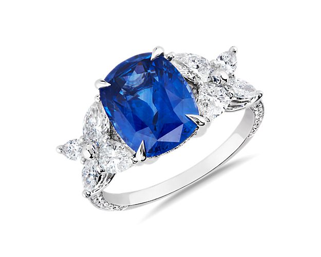 Crafted in 18k white gold, this ring features a stunning blue sapphire that is enhanced by diamond details ensuring sparkle from every angle.  This ring is accompanied by gemstone report #:CDC1304015.