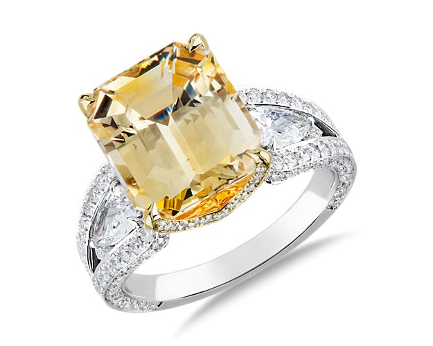 The canary yellow sapphire of this ring will brighten even the cloudiest of days. Cast with 18k white gold and featuring diamond accents, this beauty is luminous choice.  This ring is accompanied by gemstone report #:GF16012369.