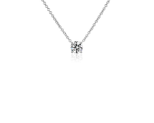 Embrace simply sophisticated luxury with this 14k white gold pendant featuring a floating lab-grown diamond style setting that highlights the sparkle of the stone.