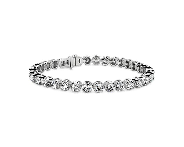 Unmatched in pure elegance, this eternity bracelet showcases forty round brilliant lab-grown diamonds set in a substantial 14k white gold bracelet, a truly iconic gift.