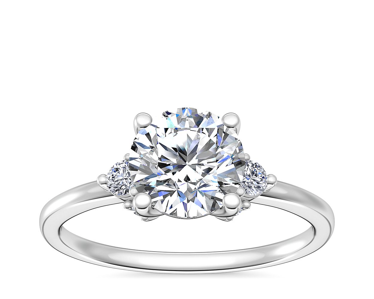 Petite Three Diamond Engagement Ring in Platinum (1/10 ct. tw.)