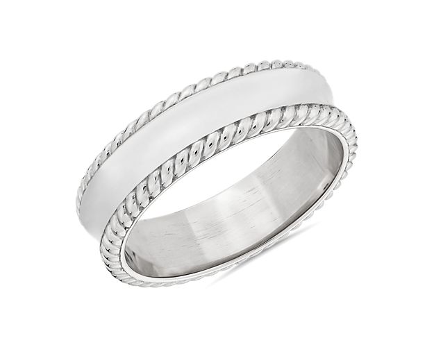 Capture eternal romance with this simple and sophisticated band crafted from lustrous 18k white gold. The edge features a twisted rope texture that gives it eye-catching detail.