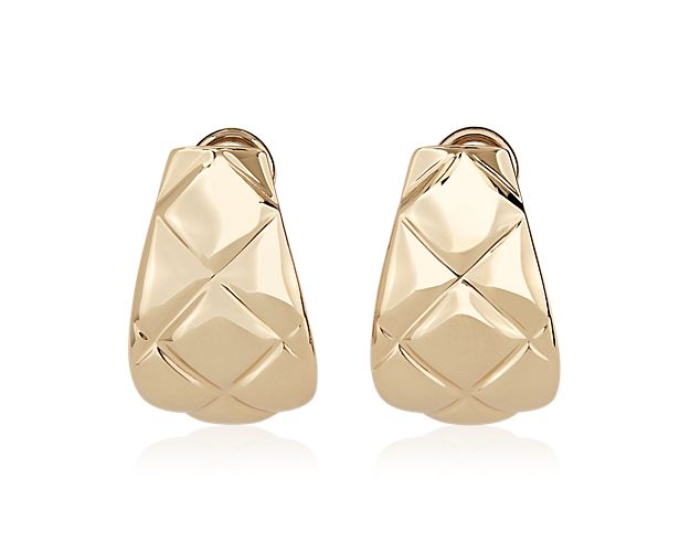 Crafted in luxurious 14k yellow gold, these statement earrings feature a beautiful quilted design.