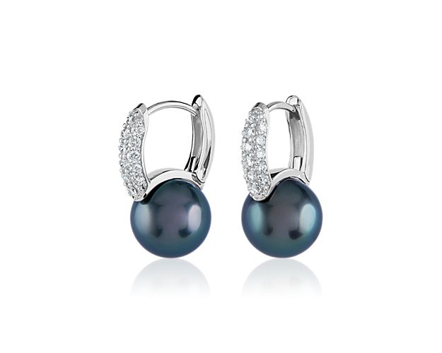 Set in 14k white gold, these beautiful earrings feature luxurious Tahitian pearls set with a double row of diamonds for added sparkle.  Perfect for everyday wear or for a big night out.