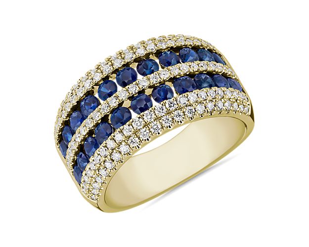 Brilliant diamonds and sapphires alternate side-by-side in this dramatic ring featuring a double row design. The 14k yellow gold design complements the hue of the stones.