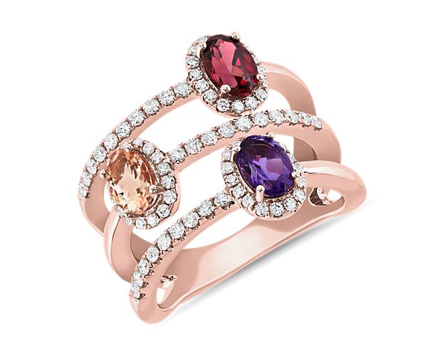 This ring features amethyst, morganite and rhodolite garnet gemstones that sparkle in a split design that splays it into the appearance of three bands. Delicate accent diamonds add brilliance along the lustrous 14k rose gold design..
