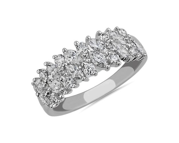 Marquise-cut diamonds perfectly nestle with round diamonds to form rows of sparkle. Set in gleaming platinum, this glamorous ring is sure to turn heads.