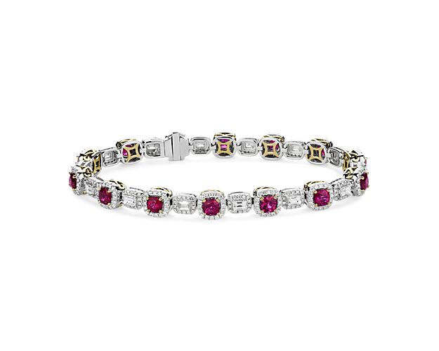 This bracelet features alternating cushion cut rubies and emerald cut diamonds, all surrounded by sparkling diamonds which come together to create a shimmering halo.