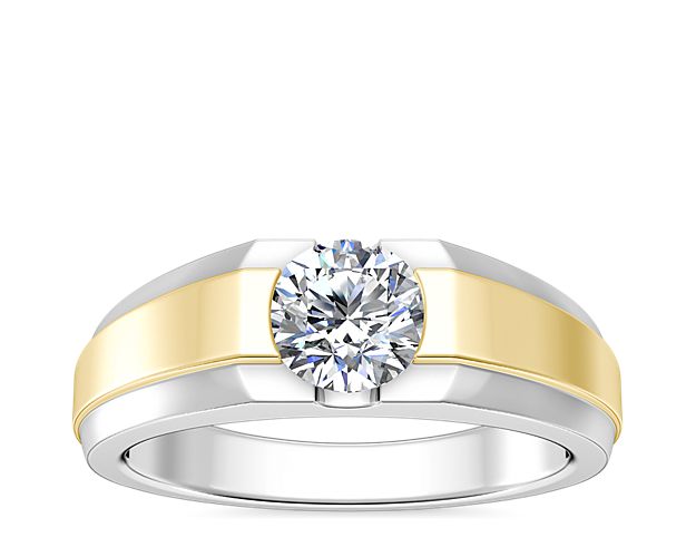 This handsome engagement ring features an elegant semi-bezel two-tone design in lustrous 14k white and yellow gold. The center setting can hold your chosen round, princess (prince), emerald-cut, radiant, asscher, or cushion-cut diamond.