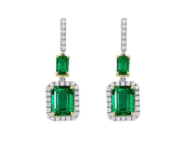 Graceful in style, these drop earrings are embellished with round pavé diamonds that cascade and frame vibrant emerald-cut emerald set in 18k yellow and white gold.