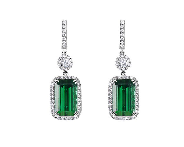 This beautiful earring showcases a pair of rich green tourmaline stones framed by a shimmering diamond halo.  These drop earrings are a must-have.