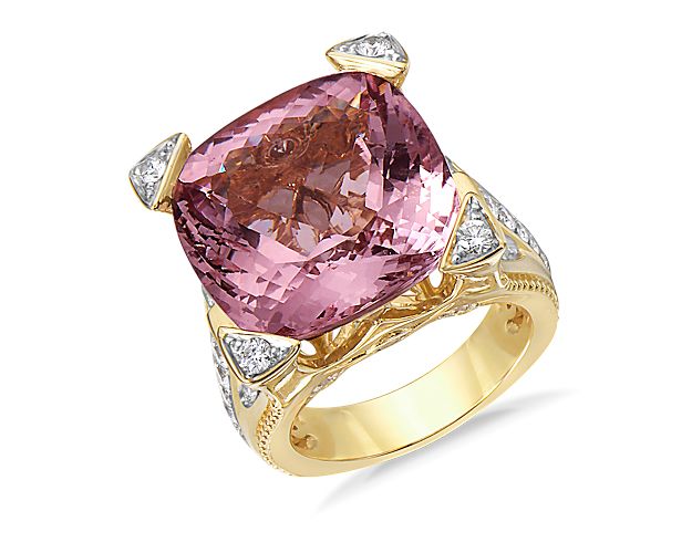 This ring features a stunning cushion-cut morganite center stone set in 18k yellow gold.  Diamond detailing throughout the ring offers an extra sparkle so that no matter what angle you look at it, this ring shines bright.