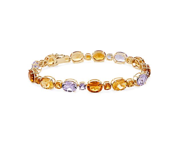 Bring bold sparkle to your ensemble with this stunning bracelet set with oval- and cushion-cut citrine and pink amethyst stones. The warm hues of the stones are beautifully matched by the 14k yellow gold design.