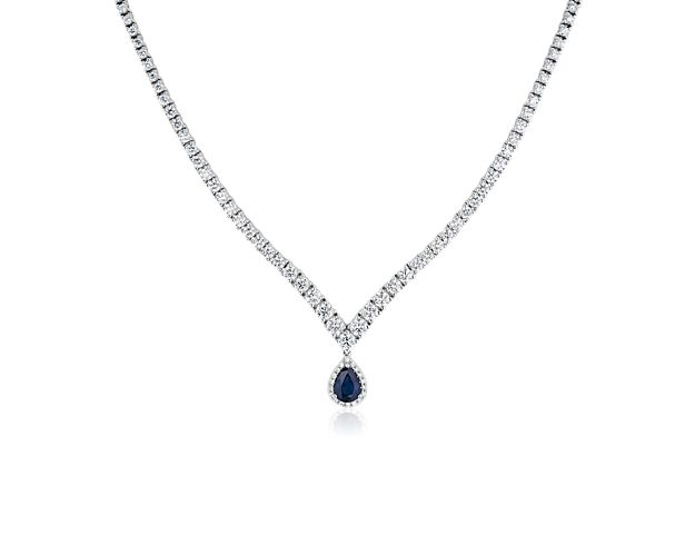 Capture the eye with this gracefully curving chevron necklace, beautifully crafted from luxurious 14k white gold. Diamonds shimmer along the sides, and an elegant pear-cut sapphire hangs beautifully from the apex of the necklace.