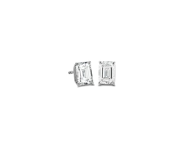 Channel timeless elegance as you add sparkle to your style with these stud earrings featuring brilliant emerald-cut diamonds. The 14k white gold setting completes the look with luxurious lustre.