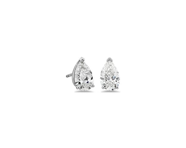 Sparkle brilliantly as you catch the light wearing these classic stud earrings set with pear-cut diamonds. The settings are beautifully crafted from gleaming 14k white gold.
