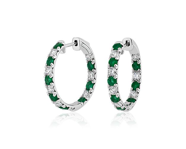 Stand out in these bold hoop earrings set with brilliant green emeralds and French pavé-set diamonds that shimmer in the light. The lustrous 14k white gold design promises timeless luxury.
