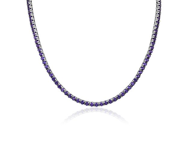 Richly purple-hued amethysts gleam along the length of this classic eternity necklace, adding pop of color to your style. It is 3mm wide and beautifully crafted from sterling silver.