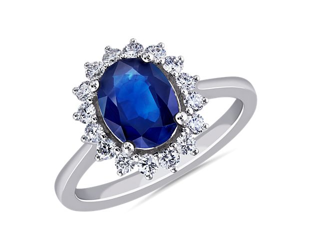 Oval Sapphire and Diamond Sunburst Halo Ring in 14k White Gold (9x7mm)