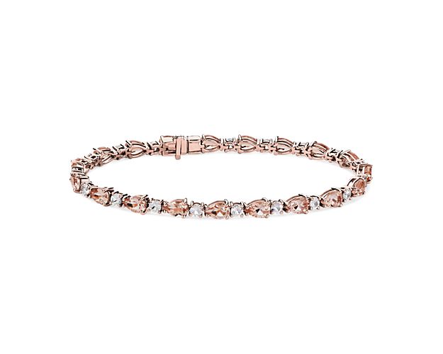 Pear-cut morganite stones alternate with round white sapphires along the length of this eye-catching bracelet. It features warmly gleaming rose gold design that complements the stones.