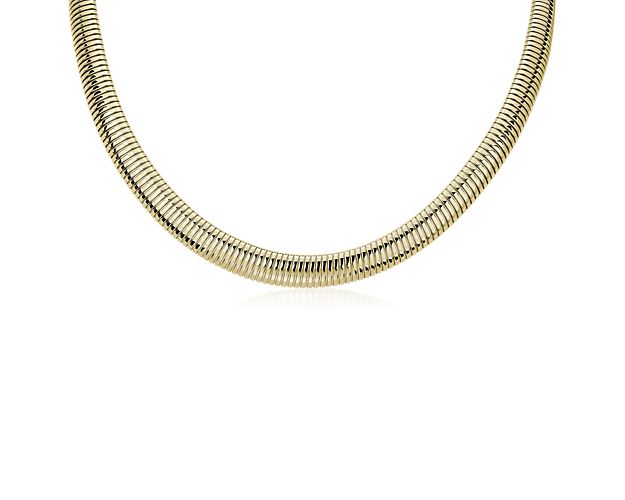 Bring a touch of timeless luxury to your look with this necklace featuring contemporary dome detail. It is artfully crafted from luxurious 14k yellow gold that gleams warmly as it catches the light.