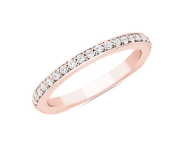 Bright diamonds bring dramatic sparkle to this breath-taking Bella Vaughan wedding band. The gleaming 18k rose gold design features an elegant Euro shank shape that give it contemporary allure.