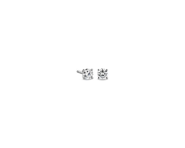 Beautifully matched, these stud earrings feature round lab-grown diamonds for a total of 1/4 carats, set in 14k white gold four-prong settings.