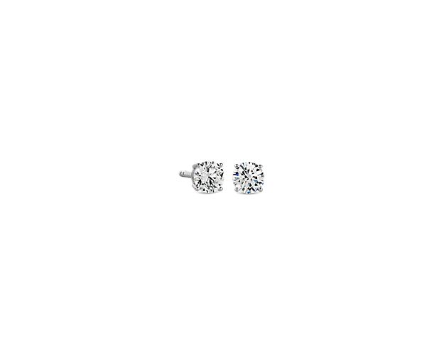 Beautifully matched, these stud earrings feature round lab-grown diamonds for a total of 1/2 carats, set in 14k white gold four-prong settings.