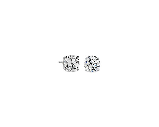 Beautifully matched, these stud earrings feature round lab-grown diamonds for a total of 1 carats, set in 14k white gold four-prong settings.