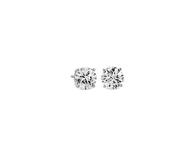 Beautifully matched, these stud earrings feature round lab-grown diamonds for a total of 1 1/2 carats, set in 14k white gold four-prong settings.