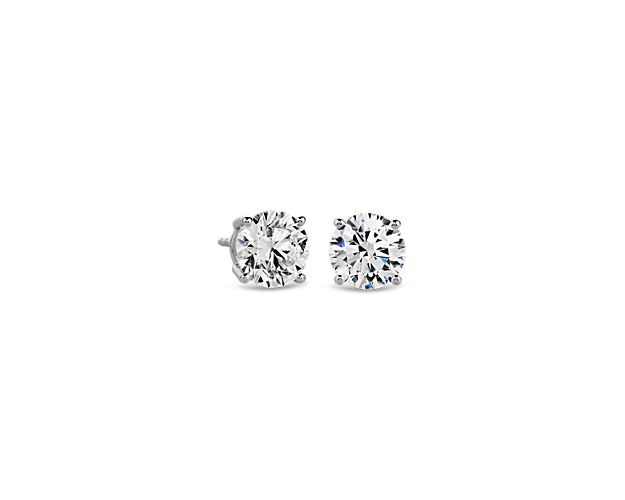 Beautifully matched, these stud earrings feature round lab-grown diamonds for a total of 2 carats, set in 14k white gold four-prong settings.