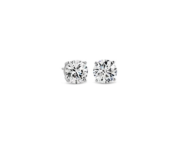 Beautifully matched, these stud earrings feature round lab-grown diamonds for a total of 2 1/2 carats, set in 14k white gold four-prong settings.