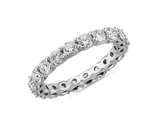 Boasting breathtaking sparkle, this eternity ring features 2 ct. tw. in lab-grown diamonds encircling it. The comfortable low dome design is crafted from cooly lustrous 14k white gold.